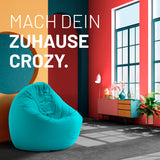 LUMALAND Sitzsack Drops (300 L) Aquamarin in modernem Wohnraum für drinnen und draußen bequem sitzen und liegen.